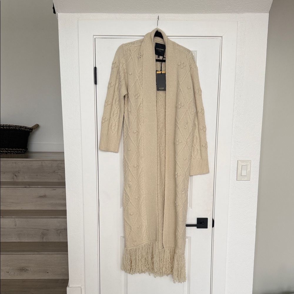 Elegant Cream Cardigan with Fringe